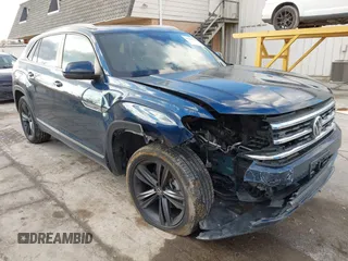 2021 Volkswagen Atlas SE z VIN 1V2RE2CA0MC200842, wystawiony jako IAAI lot #41689870 z przebiegiem 61 298 mil mil oraz . Historia ofert i sprzedaży dostępna na DreamBid. Obrazek 1.
