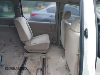 2001 Mazda MPV DX z VIN JM3LW28G210192393, wystawiony jako IAAI lot #42366997 z przebiegiem Nie podano mil oraz . Historia ofert i sprzedaży dostępna na DreamBid. Obrazek 8.
