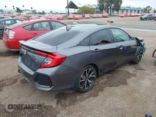 2018 Honda Civic Si z VIN 2HGFC1E59JH710458, wystawiony jako IAAI lot #42147386 z przebiegiem 89 650 mil mil oraz . Historia ofert i sprzedaży dostępna na DreamBid. Obrazek 4.