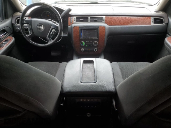 2007 Chevrolet Tahoe LT z VIN 1GNFC13047R276388, wystawiony jako Copart lot #53469155 z przebiegiem Nie podano mil oraz Szkoda całkowita • Salvage title. Historia ofert i sprzedaży dostępna na DreamBid. Obrazek 8.