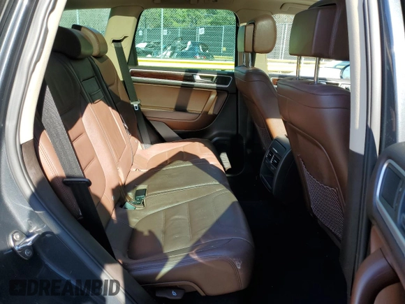 2012 Volkswagen Touareg Lux с VIN WVGEK9BP1CD008132, выставлен на аукционе Copart как лот 49501765 с пробегом 156 594 миль миль и Списание • Salvage title. История ставок и продаж доступна на DreamBid. Изображение 11.