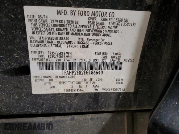 2014 Ford Taurus SEL z VIN 1FAHP2E82EG186640, wystawiony jako Copart lot #55820205 z przebiegiem 194 843 mil mil oraz Czysty tytuł • Clean title. Historia ofert i sprzedaży dostępna na DreamBid. Obrazek 12.