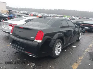 2015 Chrysler 300 Limited with VIN 2C3CCAAG8FH807168, listed as a IAAI auction lot 41056399 with Not Provided miles. Bid and sale history available at carsss.com. Image 4.