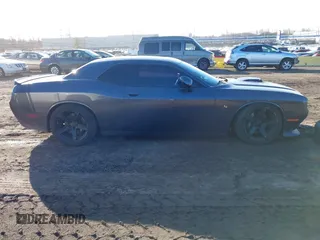 2016 Dodge Challenger R/T Scat Pack z VIN 2C3CDZFJ1GH249729, wystawiony jako IAAI lot #41589369 z przebiegiem 44 555 mil mil oraz . Historia ofert i sprzedaży dostępna na DreamBid. Obrazek 13.