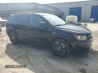 2018 Dodge Journey SE with VIN 3C4PDCABXJT242593, listed as a Copart auction lot 49830085 with 176,553 mi miles and Salvage Title. Bid and sale history available at carsss.com. Image 4.