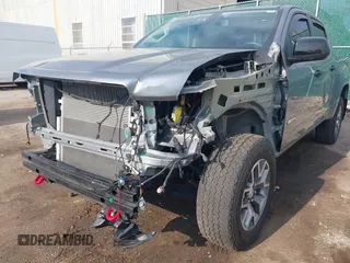 2022 GMC Canyon 4WD AT4 z VIN 1GTG6FEN2N1101756, wystawiony jako IAAI lot #42107148 z przebiegiem 37 900 mil mil oraz . Historia ofert i sprzedaży dostępna na DreamBid. Obrazek 6.