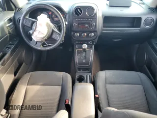 2014 Jeep Patriot Latitude with VIN 1C4NJRFB9ED759908, listed as a Copart auction lot 63874905 with 61,960 mi miles and Salvage title. Bid and sale history available at DreamBid. Image 8.