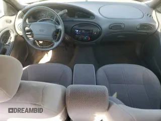 1998 Ford Taurus LX z VIN 1FAFP52U5WA273382, wystawiony jako Copart lot #77102854 z przebiegiem 73 014 mil mil oraz Szkoda całkowita • Salvage title. Historia ofert i sprzedaży dostępna na DreamBid. Obrazek 8.