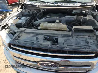 2019 Ford F-150 с VIN 1FTNF1E42KKE68423, выставлен на аукционе Copart как лот 81227495 с пробегом 130 477 миль миль и Списание • Salvage title. История ставок и продаж доступна на DreamBid. Изображение 13.