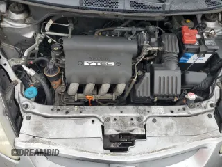 2007 Honda Fit z VIN JHMGD38477S043937, wystawiony jako Copart lot #58495495 z przebiegiem 101 800 mil mil oraz Szkoda całkowita • Salvage title. Historia ofert i sprzedaży dostępna na DreamBid. Obrazek 11.