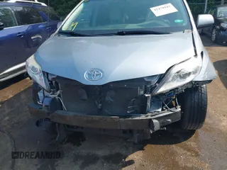 2014 Toyota Sienna Limited with VIN 5TDDK3DC0ES087274, listed as a IAAI auction lot 42478942 with 102,265 mi miles and . Bid and sale history available at DreamBid. Image 6.