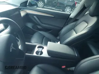 2023 Tesla Model 3 z VIN 5YJ3E1EA7PF573852, wystawiony jako Copart lot #57662565 z przebiegiem Nie podano mil oraz Szkoda całkowita • Salvage title. Historia ofert i sprzedaży dostępna na DreamBid. Obrazek 9.