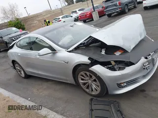 2017 Tesla Model S 60 with VIN 5YJSA1E17HF189627, listed as a IAAI auction lot 41891766 with 106,003 mi miles and . Bid and sale history available at DreamBid. Image 14.