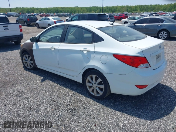 2014 Hyundai Accent GLS with VIN KMHCU4AE8EU589409, listed as a IAAI auction lot 42171087 with 209,204 mi miles. Bid and sale history available at carsss.com. Image 3.