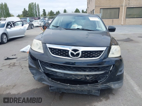 2010 Mazda CX-9 Grand Touring with VIN JM3TB2MV1A0203416, listed as a IAAI auction lot 42090500 with 131,659 mi miles and . Bid and sale history available at carsss.com. Image 12.