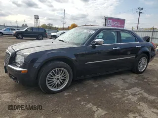 2009 Chrysler 300 z VIN 2C3LK33V19H614083, wystawiony jako Copart lot #77529014 z przebiegiem 188 125 mil mil oraz Szkoda całkowita • Salvage title. Historia ofert i sprzedaży dostępna na DreamBid. Obrazek 1.