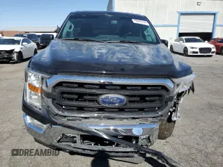 2021 Ford F-150 XL with VIN 1FTMF1E50MKD44349, listed as a Copart auction lot 76947214 with 34,592 mi miles and Salvage title. Bid and sale history available at DreamBid. Image 5.