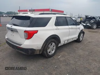 2022 Ford Explorer XLT with VIN 1FMSK7DH3NGC41301, listed as a IAAI auction lot 42256526 with 74,100 mi miles and . Bid and sale history available at DreamBid. Image 4.