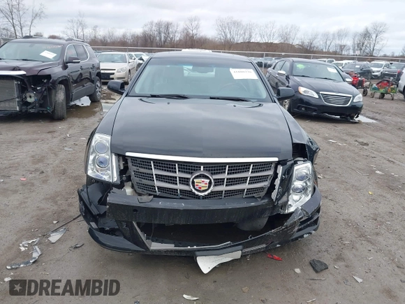 2009 Cadillac STS AWD z VIN 1G6DD67V290140111, wystawiony jako IAAI lot #41800236 z przebiegiem 81 913 mil mil oraz . Historia ofert i sprzedaży dostępna na DreamBid. Obrazek 11.