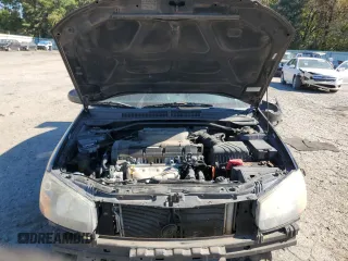 2009 Kia Spectra SX with VIN KNAFE221895022564, listed as a Copart auction lot 76997864 with 189,177 mi miles and Salvage Title. Bid and sale history available at carsss.com. Image 12.