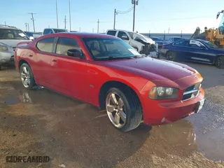 2009 Dodge Charger SXT with VIN 2B3KA33V39H544372, listed as a IAAI auction lot 41712170 with 146,036 mi miles. Bid and sale history available at carsss.com. Image 1.