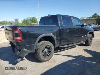 2019 Ram 1500 Rebel z VIN 1C6SRFLT5KN811457, wystawiony jako Copart lot #57034285 z przebiegiem 84 077 mil mil oraz Szkoda całkowita • Salvage title. Historia ofert i sprzedaży dostępna na DreamBid. Obrazek 3.
