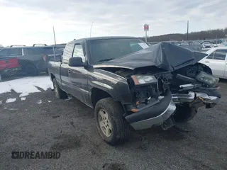 2003 Chevrolet Silverado 1500 LS with VIN 2GCEK19VX31260807, listed as a IAAI auction lot 41443970 with 180,000 mi miles. Bid and sale history available at carsss.com. Image 1.