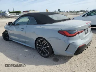 2022 BMW 4 Series M440i with VIN WBA53AT00NCK09742, listed as a Copart auction lot 42662415 with Not provided miles and Salvage title. Bid and sale history available at DreamBid. Image 2.