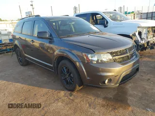 2019 Dodge Journey SE z VIN 3C4PDCBB8KT858387, wystawiony jako IAAI lot #42051620 z przebiegiem 76 126 mil mil oraz . Historia ofert i sprzedaży dostępna na DreamBid. Obrazek 1.