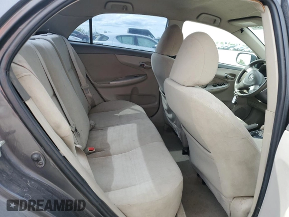 2010 Toyota Corolla with VIN 1NXBU4EE0AZ279996, listed as a Copart auction lot 52046195 with 244,615 mi miles and Salvage Title. Bid and sale history available at carsss.com. Image 10.