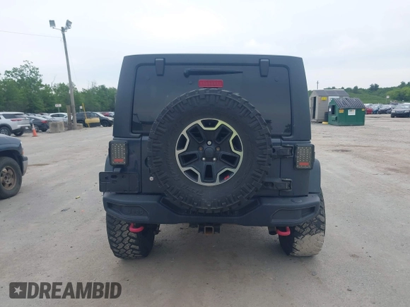 2016 Jeep Wrangler Unlimited Rubicon with VIN 1C4HJWFG6GL346862, listed as a IAAI auction lot 42441610 with 94,227 mi miles and . Bid and sale history available at DreamBid. Image 16.