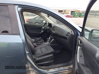 2014 Mazda CX-5 Grand Touring with VIN JM3KE4DYXE0403192, listed as a IAAI auction lot 41828016 with 156,270 mi miles and . Bid and sale history available at carsss.com. Image 5.