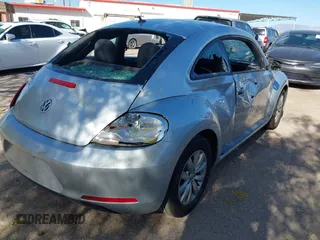 2013 Volkswagen Beetle Entry с VIN 3VWFP7AT6DM669039, выставлен на аукционе IAAI как лот 42057732 с пробегом 58 552 миль миль и . История ставок и продаж доступна на DreamBid. Изображение 4.