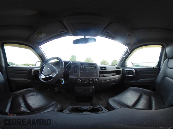 2014 Honda Ridgeline RTL with VIN 5FPYK1F5XEB011772, listed as a IAAI auction lot 42440390 with 145,219 mi miles and . Bid and sale history available at DreamBid. Image 18.