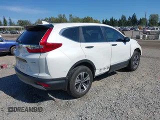 2019 Honda CR-V LX z VIN 5J6RW6H34KL001445, wystawiony jako IAAI lot #42369616 z przebiegiem 13 553 mil mil oraz . Historia ofert i sprzedaży dostępna na DreamBid. Obrazek 4.