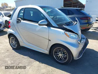 2013 Smart fortwo Pure with VIN WMEEJ3BA0DK701448, listed as a IAAI auction lot 41755755 with 66,180 mi miles. Bid and sale history available at carsss.com. Image 1.
