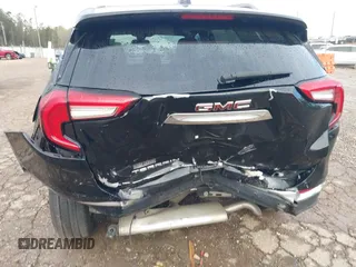 2022 GMC Terrain SLT z VIN 3GKALPEV7NL271077, wystawiony jako IAAI lot #41844024 z przebiegiem 74 823 mil mil oraz . Historia ofert i sprzedaży dostępna na DreamBid. Obrazek 6.
