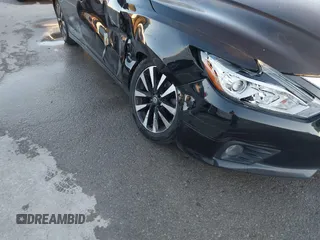 2018 Nissan Altima SR with VIN 1N4AL3AP7JC129741, listed as a IAAI auction lot 40923554 with 161,218 mi miles and . Bid and sale history available at carsss.com. Image 19.