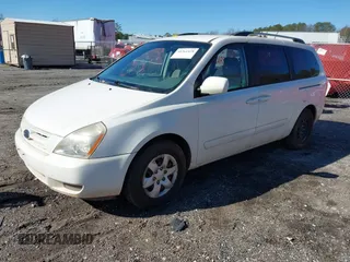 2009 Kia Sedona LX with VIN KNDMB233096312990, listed as a IAAI auction lot 41261428 with 254,323 mi miles. Bid and sale history available at carsss.com. Image 17.