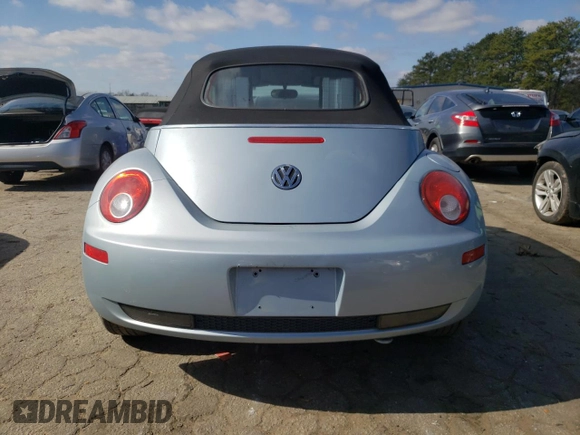 2009 Volkswagen Beetle S with VIN 3VWRF31Y09M402197, listed as a Copart auction lot 43861405 with 59,644 mi miles and Salvage title. Bid and sale history available at DreamBid. Image 6.