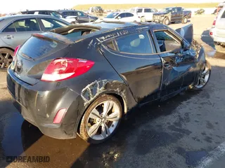 2014 Hyundai Veloster with VIN KMHTC6AD3EU184600, listed as a IAAI auction lot 41300088 with 1 mi miles. Bid and sale history available at carsss.com. Image 4.