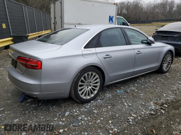 2015 Audi A8 4.0T with VIN WAUJ2AFD0FN006646, listed as a Copart auction lot 86164984 with 143,101 mi miles and Salvage title. Bid and sale history available at DreamBid. Image 3.