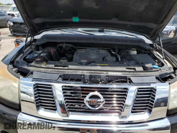 2012 Nissan Titan SV with VIN 1N6BA0ED1CN323589, listed as a Copart auction lot 62068904 with 148,354 mi miles and Salvage Title. Bid and sale history available at DreamBid. Image 11.