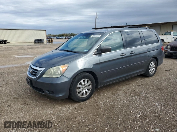 2010 Honda Odyssey EX-L with VIN 5FNRL3H72AB055070, listed as a Copart auction lot 80328974 with 221,467 mi miles and Salvage Title. Bid and sale history available at DreamBid. Image 1.
