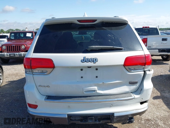2014 Jeep Grand Cherokee Summit with VIN 1C4RJFJT3EC523129, listed as a IAAI auction lot 42341296 with 171,468 mi miles and . Bid and sale history available at DreamBid. Image 16.