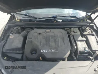 2014 Chevrolet Impala LTZ with VIN 1G1155S38EU169167, listed as a Copart auction lot 73174254 with 156,884 mi miles and Salvage Title. Bid and sale history available at DreamBid. Image 11.
