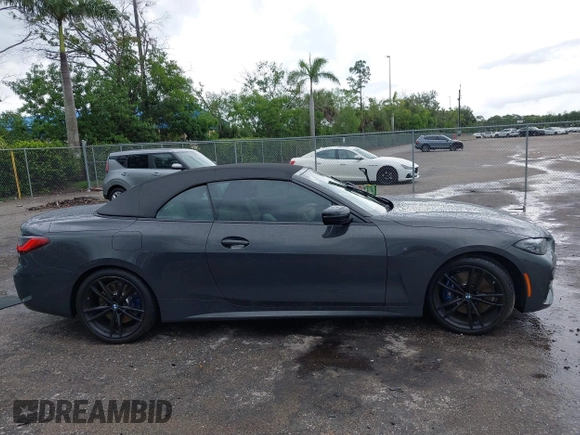 2023 BMW 4 Series 430i with VIN WBA23AT03PCL21070, listed as a IAAI auction lot 42730718 with 19,859 mi miles and . Bid and sale history available at DreamBid. Image 13.