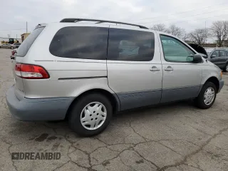 2002 Toyota Sienna LE with VIN 4T3ZF13C72U469151, listed as a Copart auction lot 82419074 with 140,040 mi miles and Salvage Title. Bid and sale history available at carsss.com. Image 3.