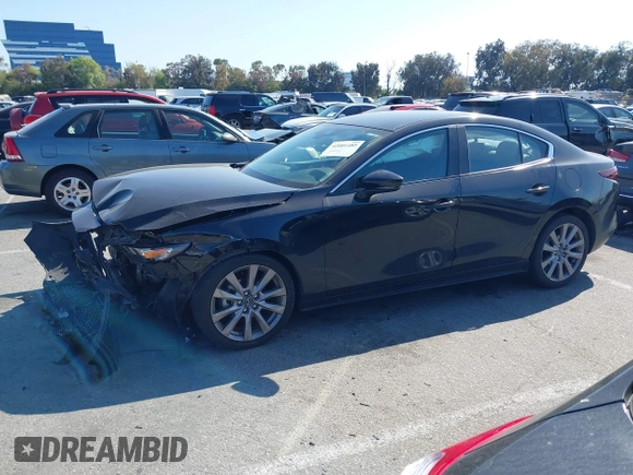 2021 Mazda 3 Select with VIN 3MZBPABL2MM250695, listed as a IAAI auction lot 42001485 with 29,672 mi miles and . Bid and sale history available at DreamBid. Image 14.