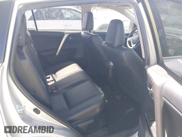 2016 Toyota RAV4 Limited with VIN JTMDJREVXGD030438, listed as a IAAI auction lot 42189476 with 106,366 mi miles and . Bid and sale history available at DreamBid. Image 8.